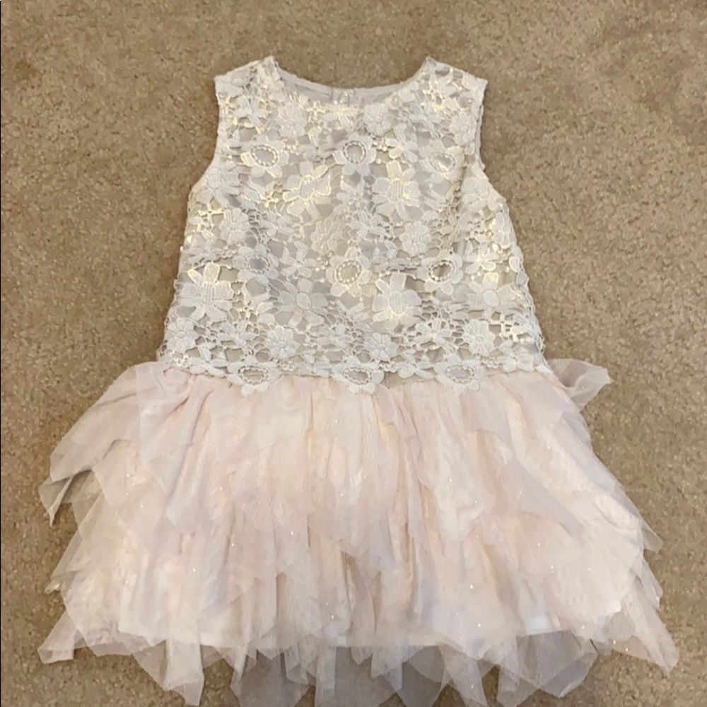 White with gold shinny accents children’s dress